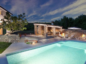 Attractive villa with private swimming pool beach volleyball and fenced garden